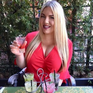 Elbow length ruffle sleeve cinched blouse